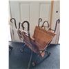 Image 1 : Heavy iron fireplace wood holder with a removable thick, riveted leather wood tote.
