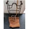 Image 4 : Heavy iron fireplace wood holder with a removable thick, riveted leather wood tote.