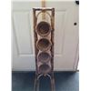 Image 3 : Wicker wine bottle rack or bathroom rolled towel holder.