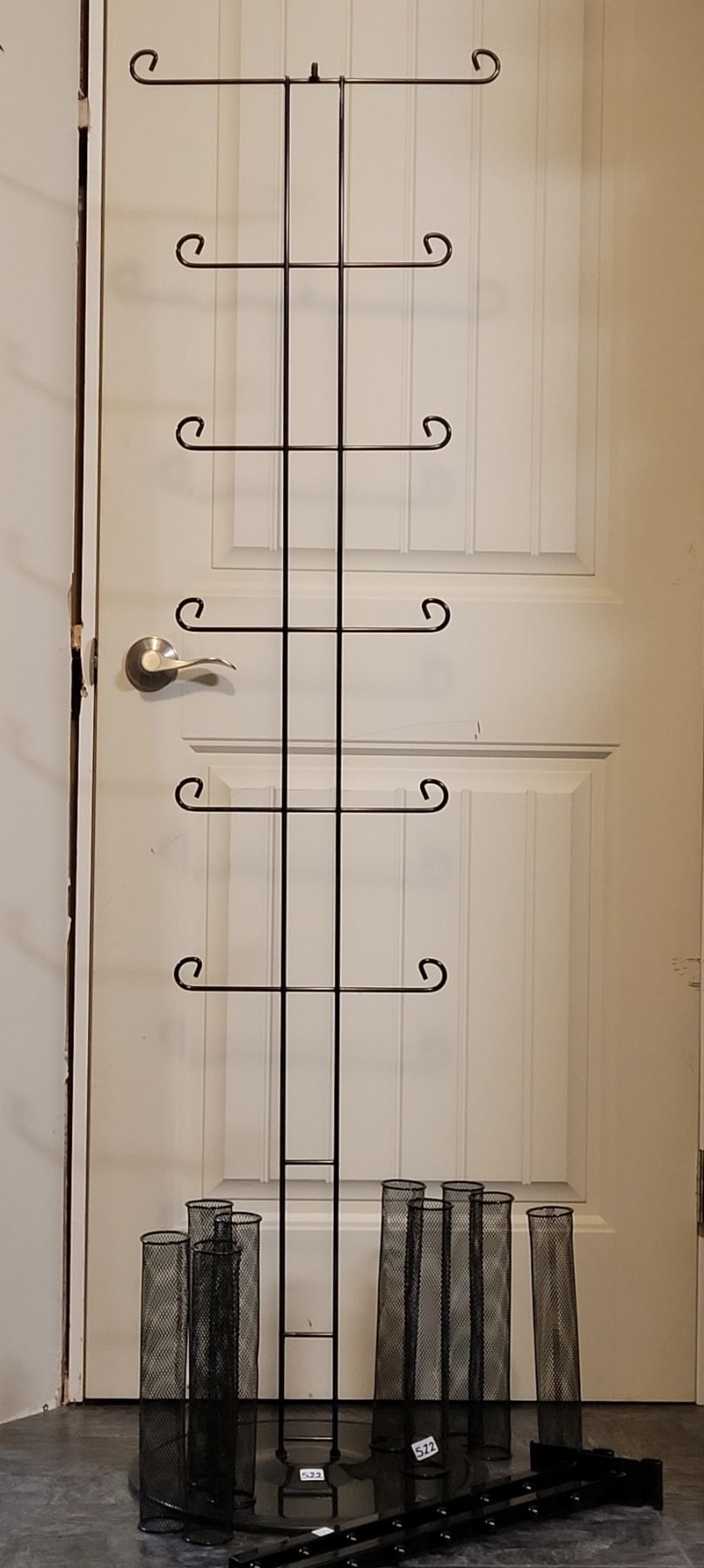 Tall metal wire display rack, wall display hooks & tubes. - Schmalz ...