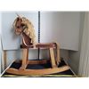 Image 1 : Vintage wooden rocking horse.