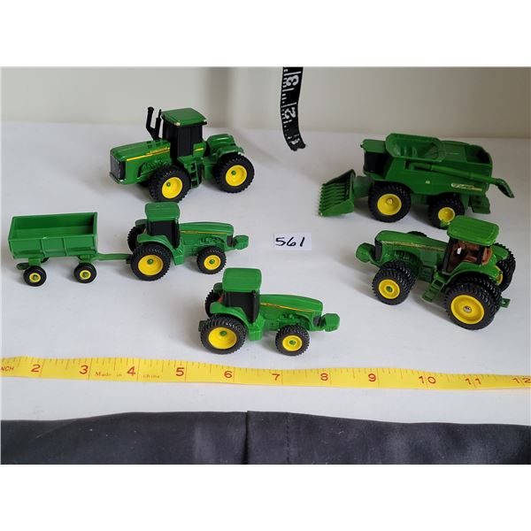 Group of John Deere farm tractors and combine.