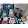 Image 1 : Vintage Riviera suitcase filled with Avon samples, cosmetic bags, colognes, massager etc.