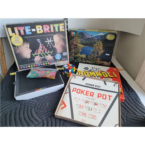 Lite-Brite, Vintage puzzle, Rummoli game & Rubik's cube.