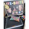 Image 3 : Lite-Brite, Vintage puzzle, Rummoli game & Rubik's cube.