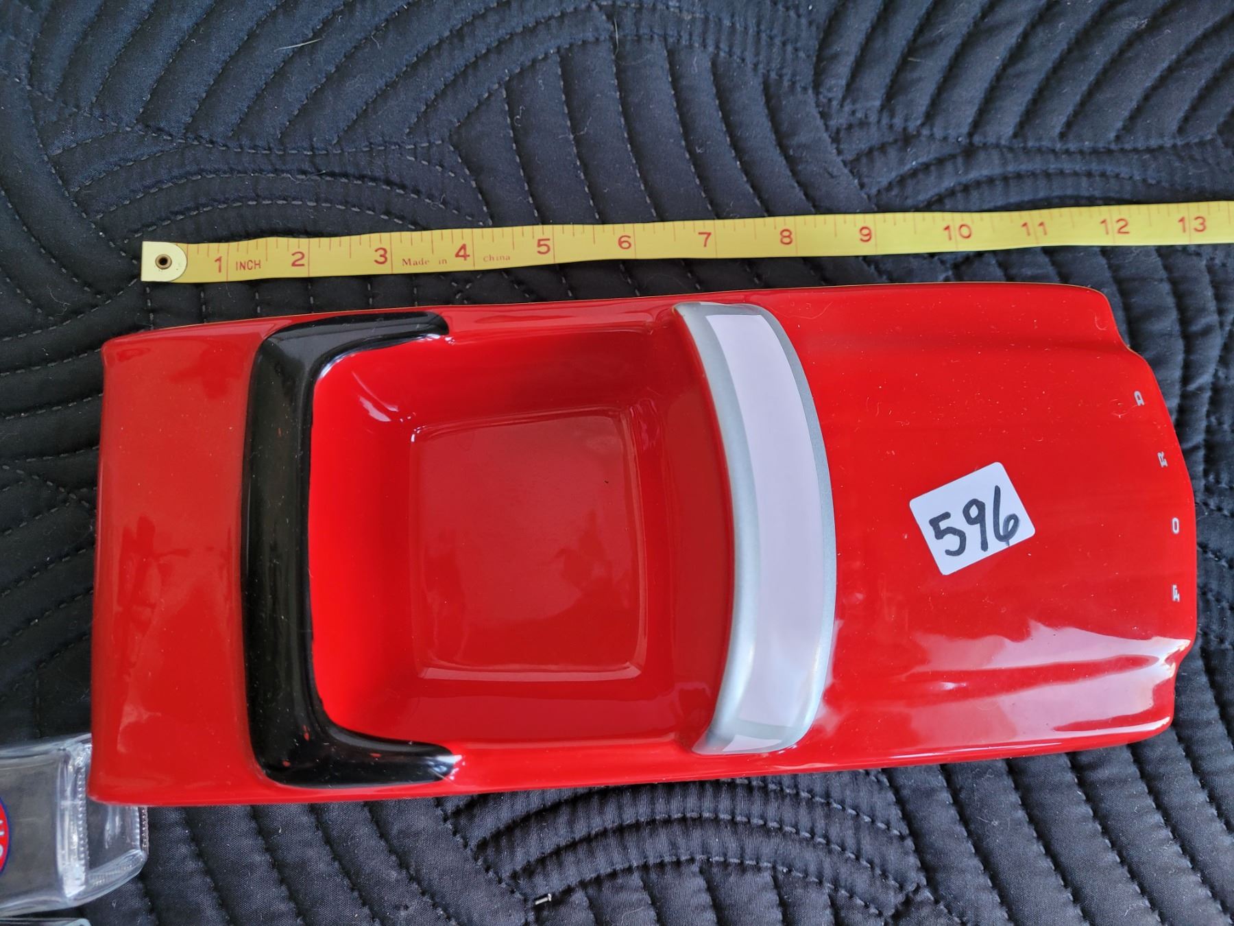 Ceramic Ford Mustang convertible with salt & pepper shakers.