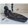 Image 1 : 1972 Canadian Aardik Collection. Inuit man in ornate carved kayak.