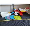Image 1 : Fisher-Price airplane with 2 people, has broken tail fin. Frypan & records for original player.