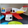 Image 2 : Fisher-Price airplane with 2 people, has broken tail fin. Frypan & records for original player.