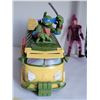 Image 2 : Teenage Mutant Ninja Turtles van & sewer lid with other super heroes and villains.