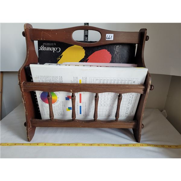 Vintage wood magazine rack with hair color salon books.