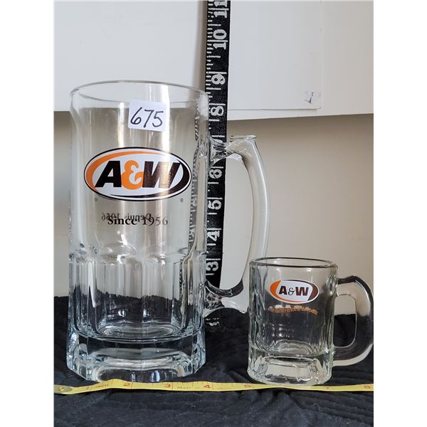 Largest and smallest older A&W mugs. Thumb rest on large mug for support.