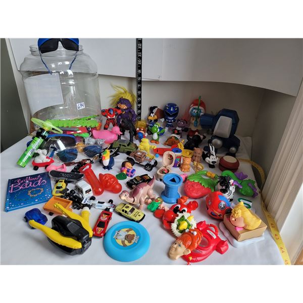 Very big barrel of assorted toys.