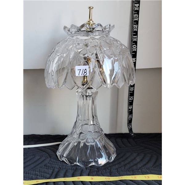 Vintage, genuine crystal lamp. Tap the shade.. has a nice ring to it.