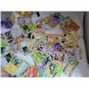 Image 2 : Pokemon collector tin with over 125 unchecked cards.