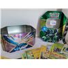 Image 2 : Pokemon collector tin with over 125 unchecked cards.