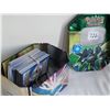 Image 9 : Pokemon collector tin with over 125 unchecked cards.