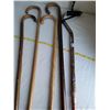 Image 3 : 4 old wood canes & 1 adjustable metal cane.