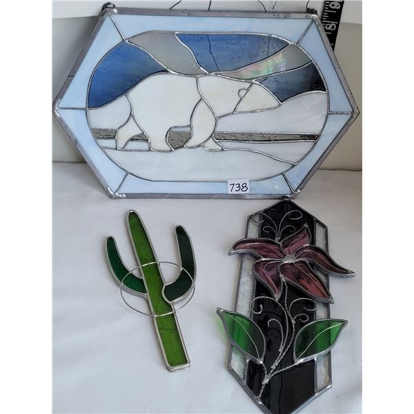 3 stained glass window pieces.