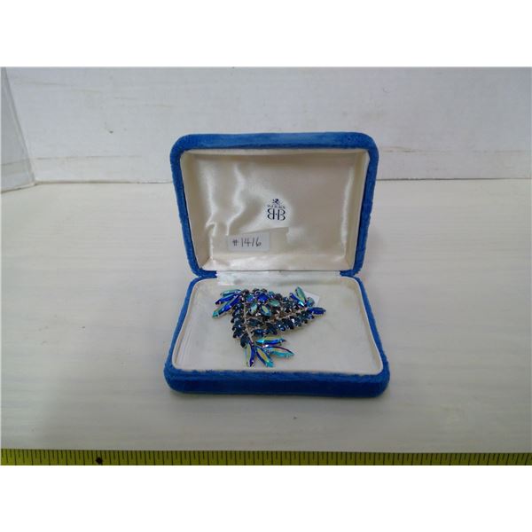 Large blue rhinestone brooch, prong set