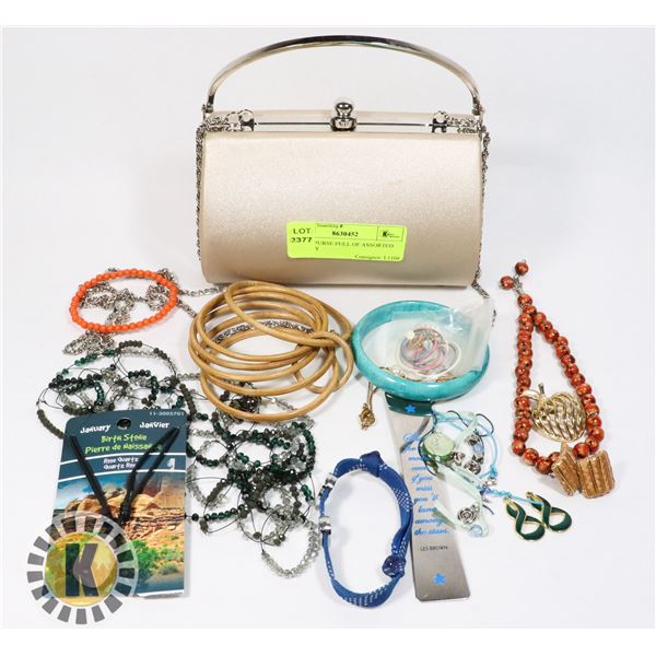 SMALL PURSE FULL OF ASSORTED JEWELRY