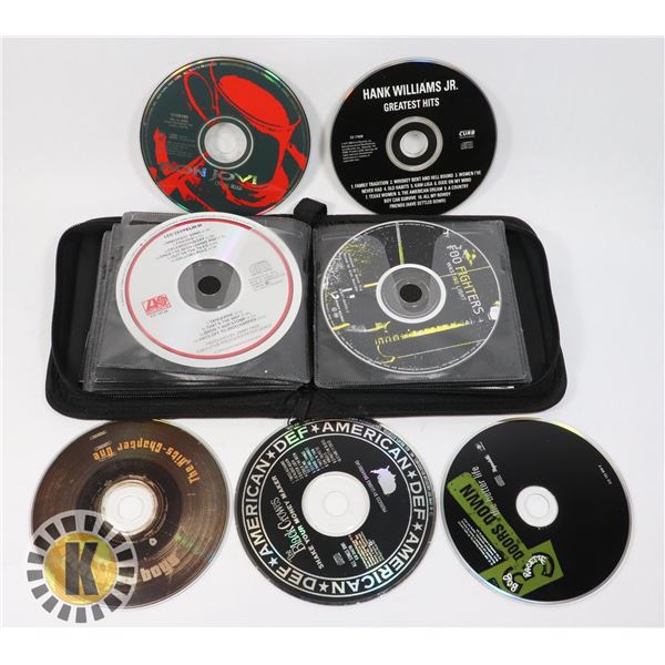 CD WITH ASSORTED CDS AND DVDS