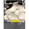 Image 1 : Bin full of cloth masks - mostly cream