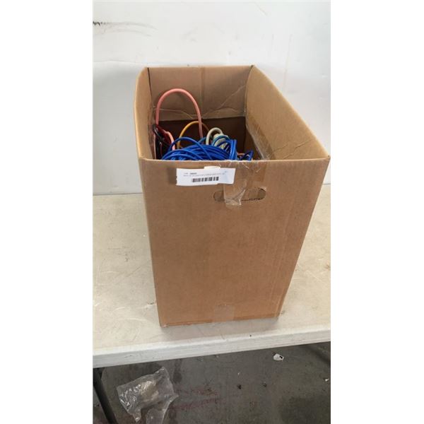 BOX OF EXTENTION CORDS AND COIL OF CAT 6 CABLE