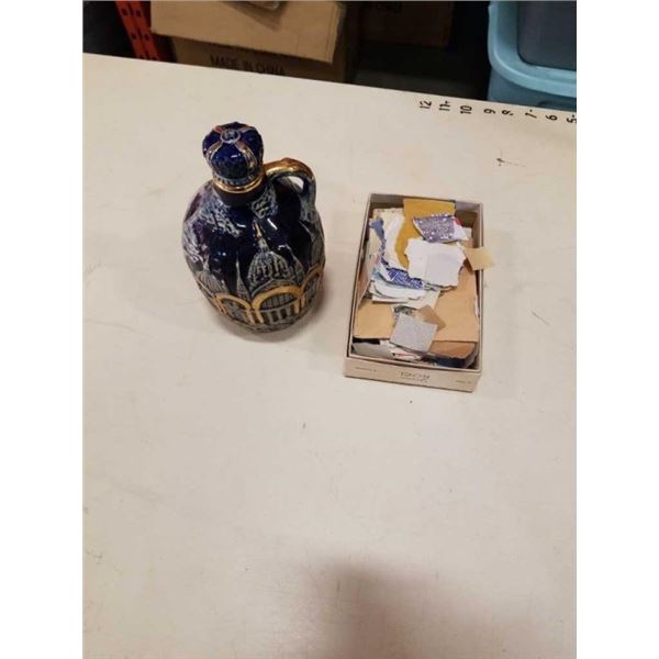 VINTAGE MUSICAL DECANTER AND BOX OF EASTERN EUROPE STAMPS