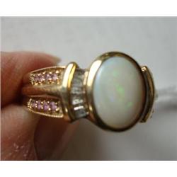 10KT White Opal Ring with Baguette Diamonds: