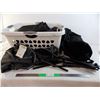 Image 1 : Laundry basket filled with ski pants dufflebages and camp chair