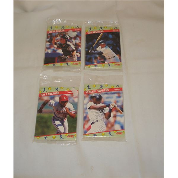 4 unopened packs baseball cards