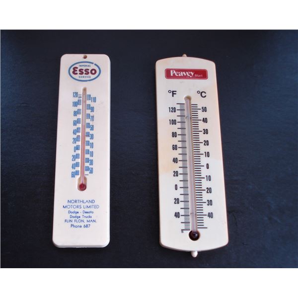 Pair of Esso and Peavey Mart thermometers