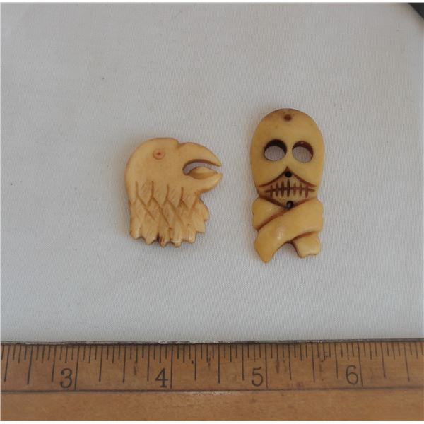 Pair of bone carvings