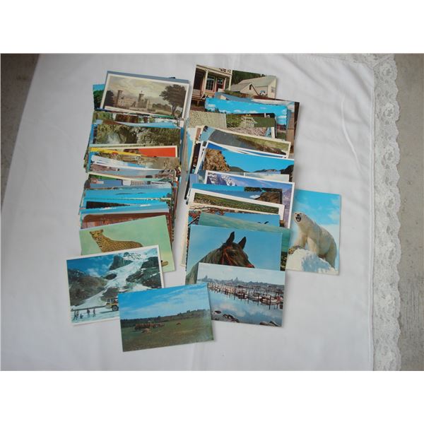 Well over 100 Vintage postcards mostly unused chrome