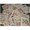 Image 1 : over 500 assorted world stamps on sheets of paper