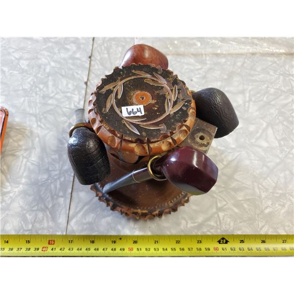 4 PIPES IN PIPE HOLDER