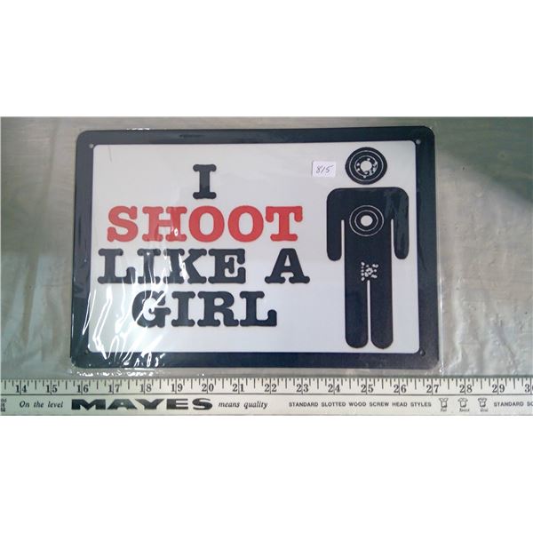 Shoot like a girl sign