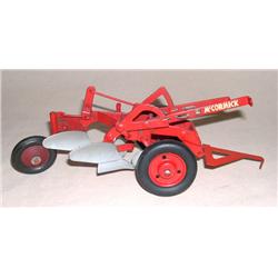 IH McCormick 2b Plow --red rims & rubber tail wheel