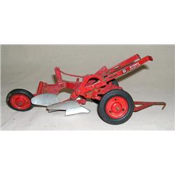 IH McCormick 2b Plow w/ red rims and tin tail wheel