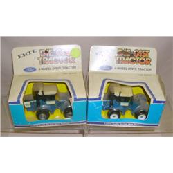 (2) Ford FW-60 1/64th's--one Gray rims, one White Rims