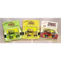 (3) Old 1/64th 4wds--MF 4880, Steiger Industrial, & Steiger Cougar