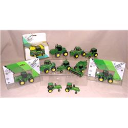 (11) JD 1/64th Tractors--some NIB, most are loose