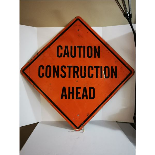 DECOMMISSIONED CAUTION ROAD SIGN