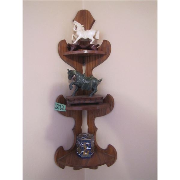 wood corner shelf with knick knacks