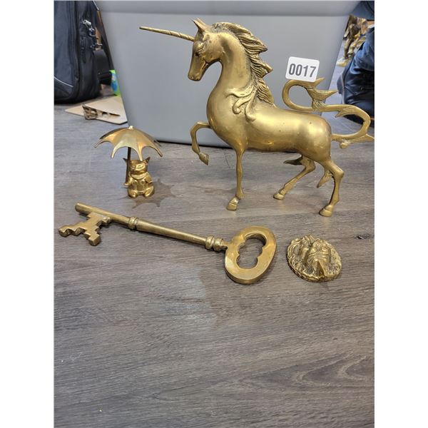 Brass Unicorn 14"h - Brass Cat/Umbrella 5"h - Large Brass Skeleton Key 10"l - Brass Lion Doorstop