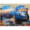 Image 2 : 26 Hot Wheels in Package plus Blackout Mystery Car