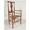 Image 1 : A 19th Century American walnut armchair with caned seat.