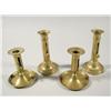 Image 1 : A group of four 19th Century brass push-up candlesticks.