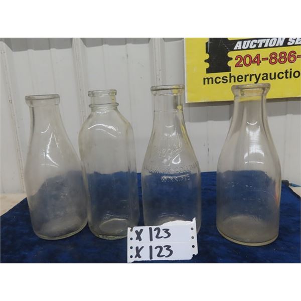 4 Milk Bottles 2 of which are Labelled